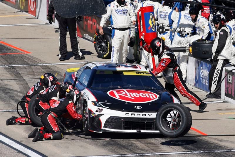 Christopher Bell (20) stops on pit road during a NASCAR Cup Series auto race at Kansas Speedway in Kansas City, Kan., Sunday, Sept. 29, 2024. (AP Photo/Colin E. Braley)