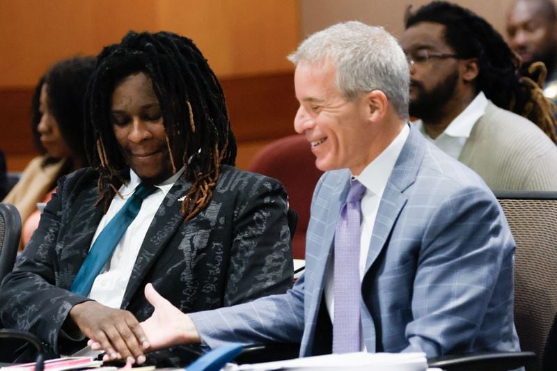 Atlanta rapper Young Thug, whose real name is Jeffery Williams, shakes hands with attorney Brian Steel during his ongoing gang and racketeering trial.Tuesday, July 30, 2024.
(Miguel Martinez / AJC)