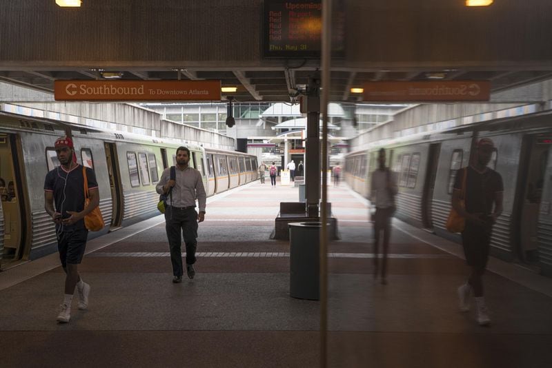 Morning commuters exit a southbound MARTA train at the Buckhead transit station in Atlanta, Thursday, May 31, 2018. ALYSSA POINTER/ATLANTA JOURNAL-CONSTITUTION