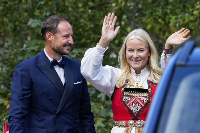 Norway's Crown Prince Haakon and Crown Princess Mette-Marit attend the wedding of Norway's Princess Martha Louise and Durek Verrett, in Geiranger, Norway, Saturday Aug. 31, 2024. (Cornelius Poppe/NTB via AP)