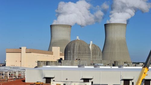 Construction of two new nuclear reactors at Plant Vogtle, shown here in 2015, is three years behind schedule. The project is the first new U.S. nuclear power plant in 30 years. BRANT SANDERLIN / BSANDERLIN@AJC.COM