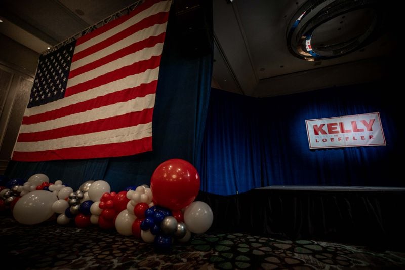 A campaign sign is seen before a watch party at the Grand Hyatt Hotel on Election Night, Tuesday, Nov. 3, 2020, in Kennesaw, Ga. Branden Camp for The Atlanta Journal-Constitution