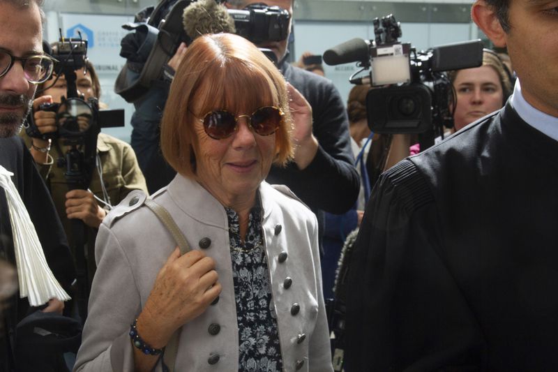 Gisele Pelicot arrives at the Avignon court house, in Avignon, southern France, Tuesday, Sept. 17, 2024. Her ex-husband admitted in court that for nearly a decade, he repeatedly drugged his unwitting wife and invited dozens of men to rape her while she lay unconscious. (AP Photo/Diane Jantet)