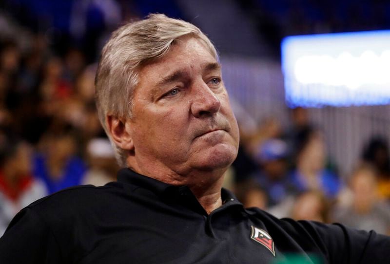 FILE - In this Jan. 13, 2019, file photo, Bill Laimbeer, head coach of the WNBA Las Vegas Aces, watches an NCAA college basketball game between UCLA and Oregon, in Los Angeles. Laimbeer knows expectations are high for his Las Vegas Aces as they were picked to win the championship in the preseason poll of the league’s general managers.  Before the veteran coach concerns himself with winning titles, he would like to see his young team learn how to win consistently first.  (AP Photo/Marcio Jose Sanchez, File)