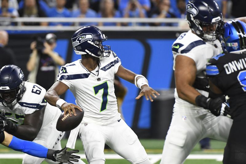 Seattle Seahawks quarterback Geno Smith (7) throws during the first half of an NFL football game against the Detroit Lions, Monday, Sept. 30, 2024, in Detroit. (AP Photo/Jose Juarez)