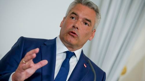 FILE - Austrian Chancellor Karl Nehammer attends a press conference in Vienna, Thursday, Aug. 8, 2024. (AP Photo/Heinz-Peter Bader, File)