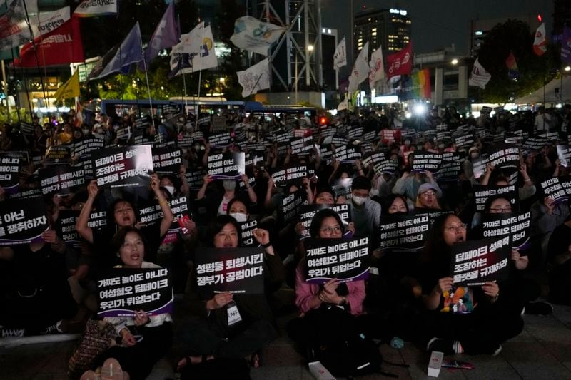 Feminist activists stage a rally against illegal deepfake content calling for the government to enact appropriate countermeasures in Seoul, South Korea, Friday, Sept. 6, 2024. The banners read "Regulate internet platforms that encourage deepfake sexual crimes." (AP Photo/Ahn Young-joon)