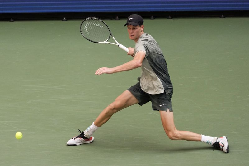 Jannik Sinner, of Italy, returns a shot to Mackenzie McDonald, of the United States, during the first round of the U.S. Open tennis championships, Tuesday, Aug. 27, 2024, in New York. (AP Photo/Julia Nikhinson)