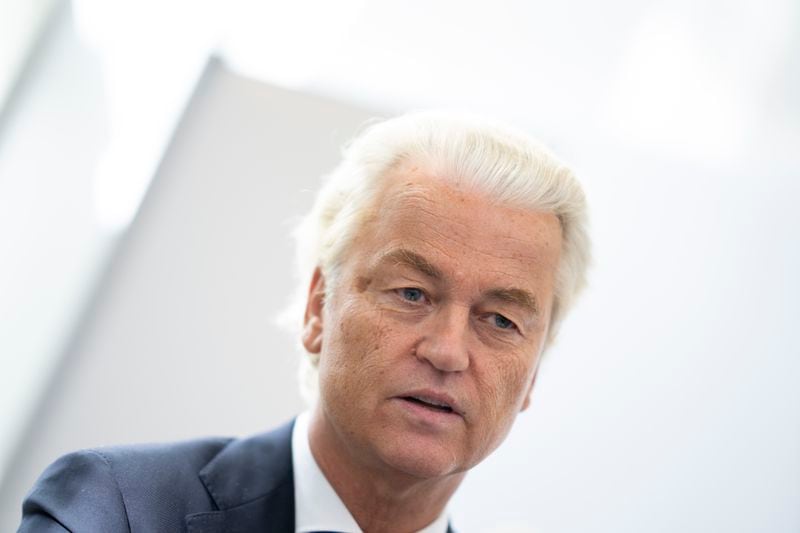 Anti-Islam lawmaker Geert Wilders answers questions after hearing the verdict against two Pakistani men convicted of threatening Wilders, at the high security court at Schiphol, near Amsterdam, Netherlands, Monday, Sept. 9, 2024, (AP Photo/Peter Dejong)