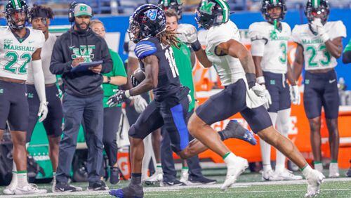 Georgia State's Tailique Williams gets loose for a 74-yard touchdown reception from Darren Grainger in the 41-24 win over Marshall on Oct. 14, 2023 at Centre Park Stadium in Atlanta.