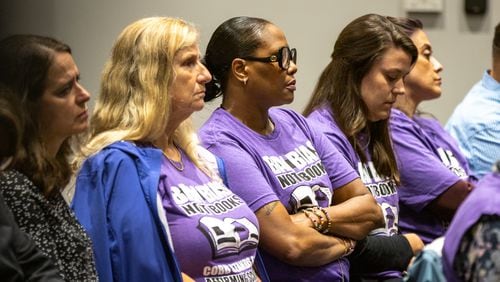 People show up in support of Cobb County teacher Katie Rinderle at a hearing at the Cobb County Board of Education in Marietta on Thursday, Aug. 10, 2023. Rinderle was fired, and controversial books have remained a focus of the community in Cobb schools. (Arvin Temkar / arvin.temkar@ajc.com)