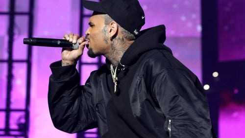 Chris Brown performs at the third annual Lil Baby & Friends Birthday Celebration at sold-out State Farm Arena in Atlanta on Friday, December 9, 2022. Performers included Drake, 21 Savage, GloRilla, Lakeya, Rocko and DJ Fresh. (Photo: Robb Cohen for The Atlanta Journal-Constitution)