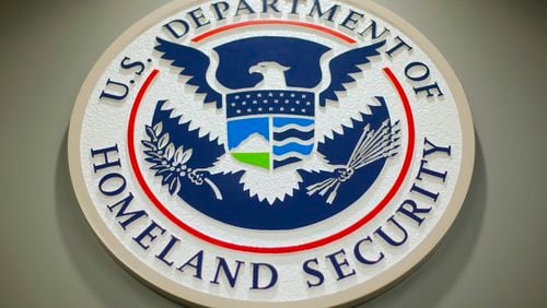 FILE - The Department of Homeland Security logo is seen during a news conference in Washington, Feb. 25, 2015. (AP Photo/Pablo Martinez Monsivais, File)