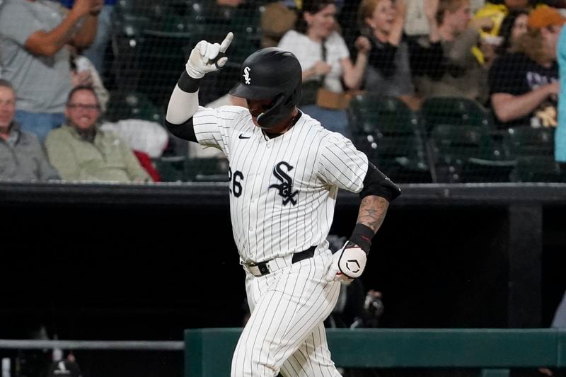 Chicago White Sox's Korey Lee gestures after hitting a two-run home run against the Los Angeles Angels during second inning of a baseball game, Wednesday, Sept. 25, 2024, in Chicago. (AP Photo/David Banks)