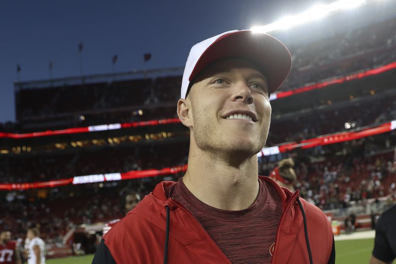 San Francisco 49ers running back Christian McCaffrey walks off the field after a preseason NFL football game against the New Orleans Saints in Santa Clara, Calif., Sunday, Aug. 18, 2024. (AP Photo/Jed Jacobsohn)