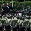 Mexican President Claudia Sheinbaum, center, reviews the troops with Defense Minister Gen. Ricardo Trevilla Trejo, left, and Navy Secretary Alt. Raymundo Pedro Morales at Campo Marte in Mexico City, Thursday, Oct. 3, 2024. (AP Photo/Fernando Llano)