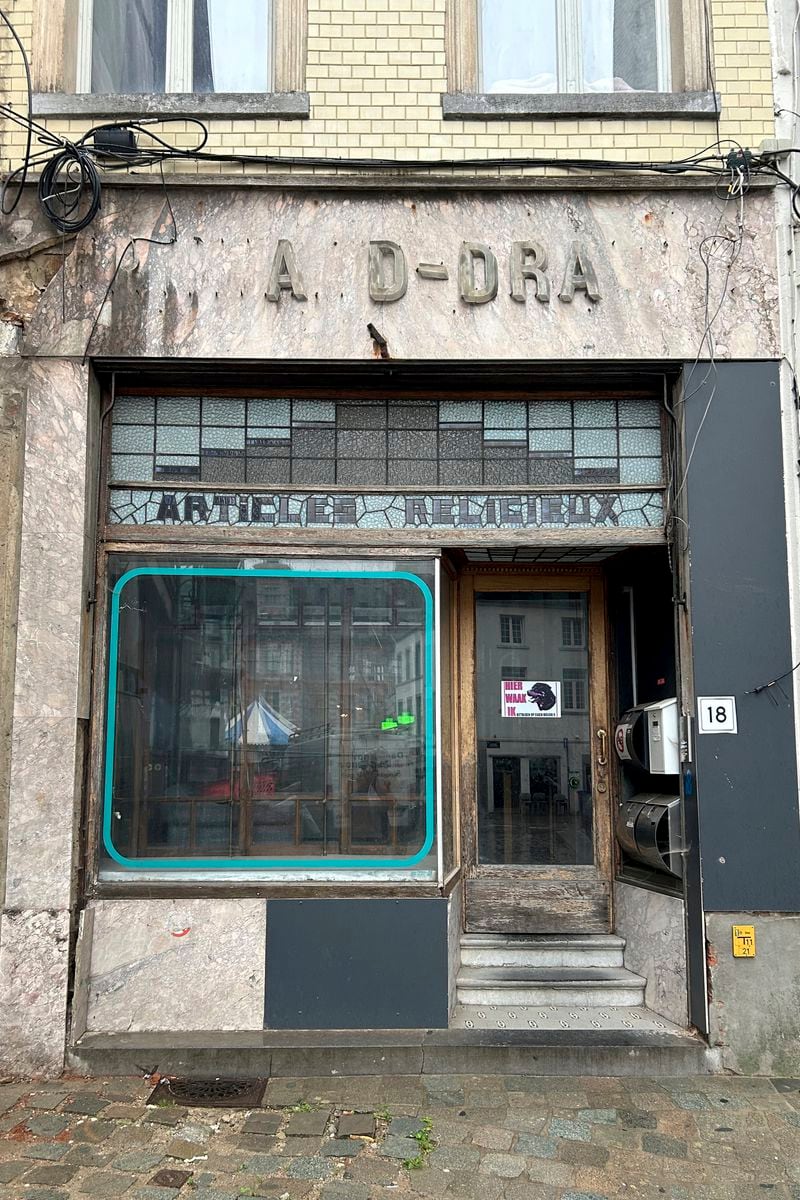 A view of an abandoned shop near St. Martin's Basilica which used to sell religious items, in Halle, Belgium, Sept. 6, 2024. (AP Photo/Raf Casert)