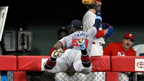 Atlanta Braves outfielder Michael Harris II (23) robs Philadelphia Phillies infielder Austin Hays (9) of a home run during the seventh inning of a MLB game between the Philadelphia Phillies and Atlanta Braves on August 31, 2024, at Citizens Bank Park in Philadelphia, PA. (Photo by Nick Wosika/Icon Sportswire) (Icon Sportswire via AP Images)