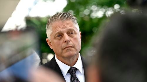 Former vice-admiral Haydn Edmundson listens to questions outside the courthouse after being found not guilty of sexual assault and an indecent act, Monday, Sept. 16, 2024, in Ottawa. (Justin Tang/The Canadian Press via AP)