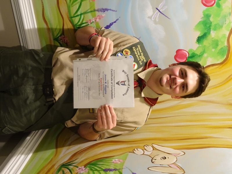 Jesse Riggins, of Troop 429, sponsored by Alpharetta Presbyterian Church,
whose project was the cleaning out of a storage trailer and designing and constructing 2 shelving
units 4’x 22’for St. Aidan’s Episcopal Church