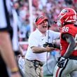 Georgia wide receiver Dillon Bell (86) is congratulated by head coach Kirby Smart after scoring a touchdown during the second half in an NCAA football game at Sanford Stadium, Saturday, October 5, 2024, in Athens. Georgia won 31-13 over Auburn. (Hyosub Shin / AJC)