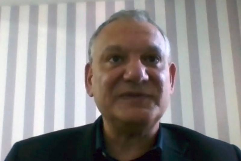 In this image made from video, Dr. Ricardo Diaz of the University of Sao Paulo, Brazil, speaks during an interview. Dr. Diaz  led a study testing strong and new drug combinations to try to purge this reservoir. 