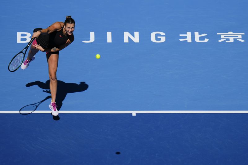 Aryna Sabalenka of Belarus returns a shot from Madison Keys of the United States during their women's singles match of the China Open tennis tournament, at the National Tennis Center in Beijing, Wednesday, Oct. 2, 2024. (AP Photo/Andy Wong)