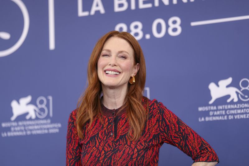 Julianne Moore poses for photographers at the photo call for the film 'The Room Next Door' during the 81st edition of the Venice Film Festival in Venice, Italy, on Monday, Sept. 2, 2024. (Photo by Vianney Le Caer/Invision/AP)