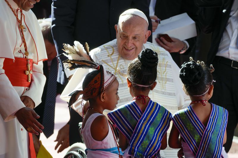 Pope Francis arrives at the 'Irmas ALMA' (Sisters of the Association of Lay Missionaries) School for Children with Disabilities in Dili, East Timor, Tuesday, Sept. 10, 2024. Pope Francis has indirectly acknowledged the abuse scandal in East Timor involving its Nobel Peace Prize-winning independence hero Bishop Carlos Filipe Ximenes Belo. "Let us also not forget that these children and adolescents have their dignity violated," Francis said. "In response, we are all called to do everything possible to prevent every kind of abuse and guarantee a healthy and peaceful childhood for all young people." (AP Photo/Gregorio Borgia)