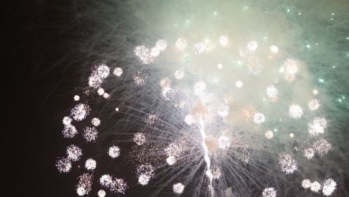 Fireworks burst into air during the July 4th celebration in Marietta. (Michael Blackshire/Michael.blackshire@ajc.com)