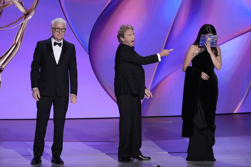 Steve Martin, from left, Martin Short, and Selena Gomez present the award for outstanding supporting actor in a comedy series during the 76th Primetime Emmy Awards on Sunday, Sept. 15, 2024, at the Peacock Theater in Los Angeles. (AP Photo/Chris Pizzello)