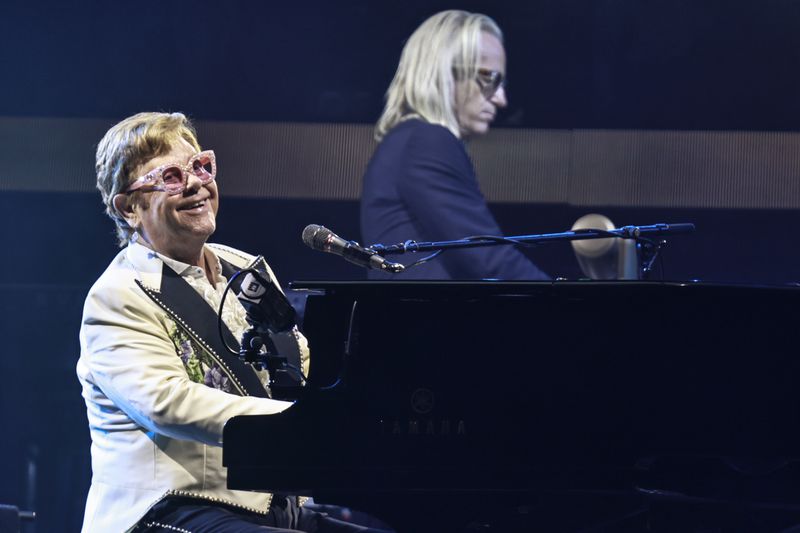 Elton John performs during Farewell Yellow Brick Road, The Final Tour at Mercedes Benz Stadium on Thursday, September 22, 2022.  (Natrice Miller / natrice.miller@ajc.com)