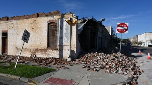 Hurricane Helene destroyed many buildings in downtown Valdosta, Saturday, September 28, 2024. The devastation in Valdosta was extensive after the South Georgia city was battered with hurricane-force winds on Helene’s path across the state. Damaging Helene has swept through Georgia, leading to at least 15 deaths. All 159 counties are now assessing the devastation and working to rebuild, even as serious flooding risks linger. (Hyosub Shin / AJC)