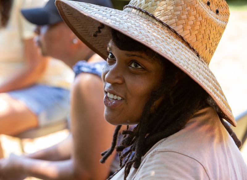 Alsie Parks of the nonprofit group Southeastern African American Farmers Organic Network joined a group of local farmers lending a hand at Bread and Butter Farms. Phil Skinner for The Atlanta Journal-Constitution 