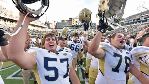 September 12, 2015 Atlanta - Georgia Tech Yellow Jackets players celebrate after defeating the Tulane Green Wave in the second half at Bobby Dodd Stadium on Saturday, September 12, 2015. Georgia Tech Yellow Jackets won 65 - 10 over the Tulane Green Wave. HYOSUB SHIN / HSHIN@AJC.COM