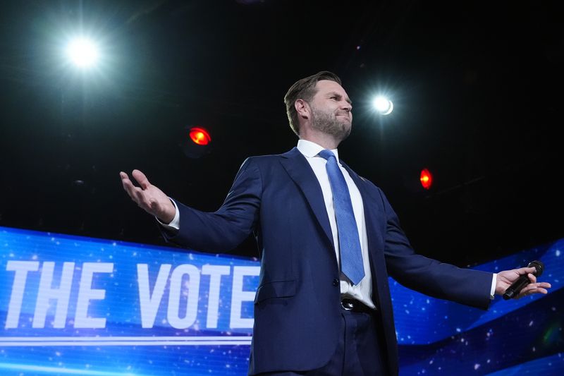 Republican vice presidential nominee Sen. JD Vance, R-Ohio, pauses to the cheering of supporters at a campaign event Wednesday, Sept. 4, 2024, in Mesa, Ariz. (AP Photo/Ross D. Franklin)