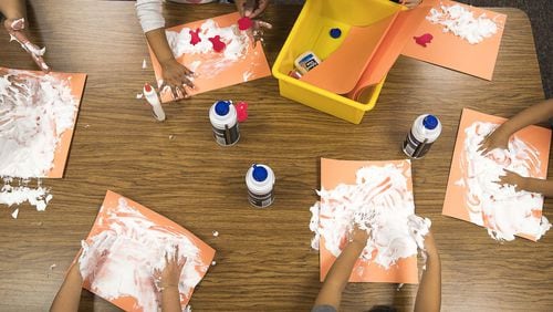 Children participate in a hands-on activity with shaving cream at an early learning program at Winn Holt Elementary School in Lawrenceville on Jan. 16, 2020. In the 2022 school year, Gwinnett County Public Schools will begin offering daily pre-K at eight elementary schools. ALYSSA POINTER/ALYSSA.POINTER@AJC.COM