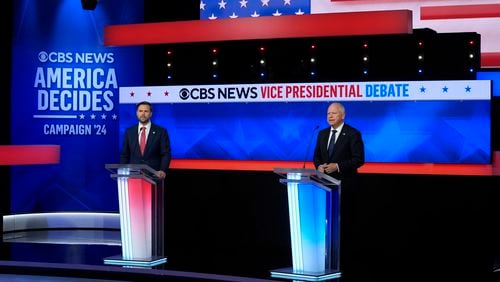 Sen. JD Vance of Ohio and Minnesota Gov. Tim Walz at the Oct. 1 vice presidential debate hosted by CBS News in New York. (Matt Rourke/AP)