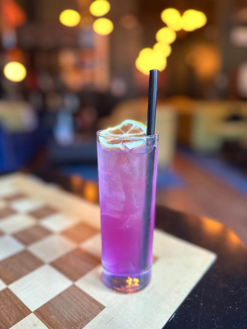Vesper adds ube syrup to its lavender-colored version of a gin and tonic. (Courtesy of Vesper)