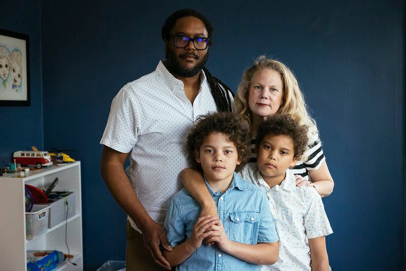 Allyson and Marcus Ward of Chicago moved across the country to be closer to family after the premature birth of their twins, Milo (left) and Theo, left them with about $80,000 in medical debt. (Taylor Glascock for KHN and NPR)