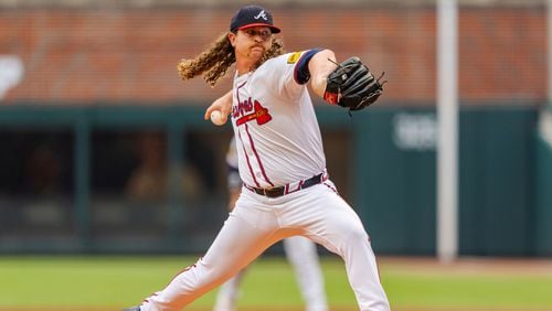 Atlanta Braves pitcher Grant Holmes throws in the second inning of the second baseball game of a doubleheader against the New York Mets, Monday, Sept. 30, 2024, in Atlanta. (AP Photo/Jason Allen)