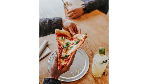 Pizza Jeans sells whole pies and sliced at Ponce City Market. / Jamestown Properties