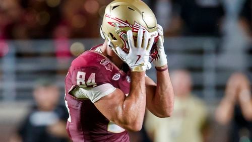 Florida State tight end Kyle Morlock reacts after dropping a pass during the second half of an NCAA college football game against Boston College, Monday, Sept. 2, 2024, in Tallahassee, Fla. (AP Photo/Colin Hackley)