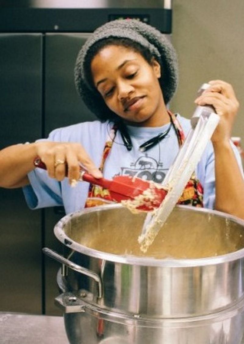 Erica Houston Pickett of Apple Butter Bakery & Custom Cake Shoppe works with a mixer in the bakery’s shared kitchen space. CONTRIBUTED BY CHRISTINA KWAN