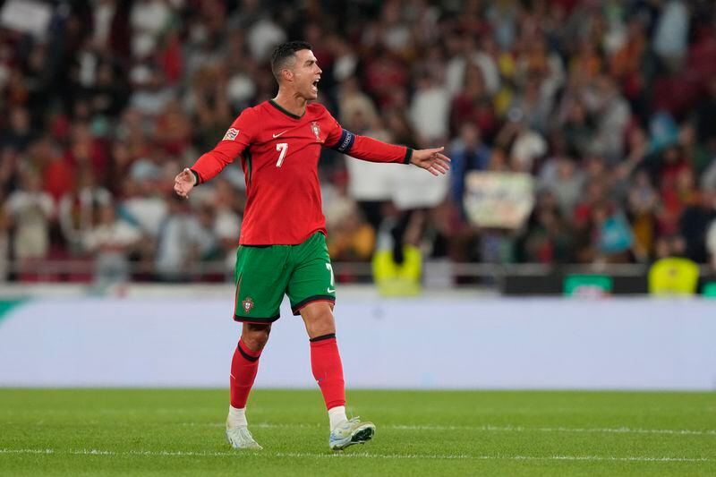 Portugal's Cristiano Ronaldo celebrates after the UEFA Nations League soccer match between Portugal and Scotland at the Luz stadium in Lisbon, Portugal, Sunday, Sept. 8, 2024. (AP Photo/Armando Franca)