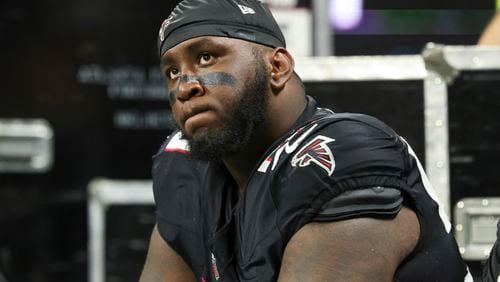 Atlanta Falcons defensive tackle Zion Logue reacts on the bench during their exhibition season game against the Jacksonville Jaguars at Mercedes-Benz Stadium, on Friday, Aug. 23, 2024, in Atlanta.  (Jason Getz / AJC)