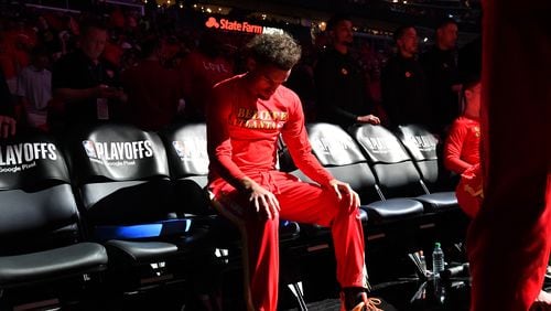 Hawks guard Trae Young (11) takes a moment before Game 4 of the first round of the NBA playoffs at State Farm Arena on Sunday, April 224, 2022. (Hyosub Shin / Hyosub.Shin@ajc.com)