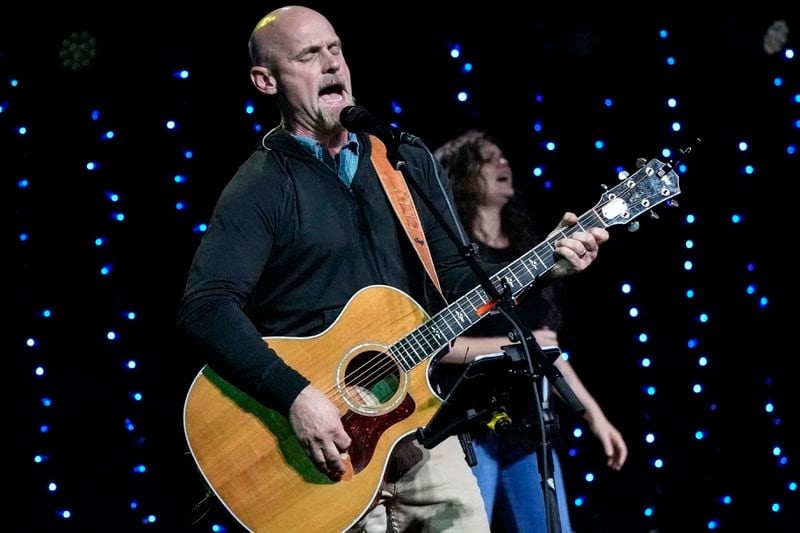 Senior Worship Pastor Joel Goddard sings during a Sunday service at Bethlehem Church, Sunday, Sept. 8, 2024, in Bethlehem, Ga. Colt Gray, 14, has been charged with murder over the killing of two students and two teachers at Apalachee High School in Barrow County, outside Atlanta, on Wednesday. (AP Photo/Mike Stewart)