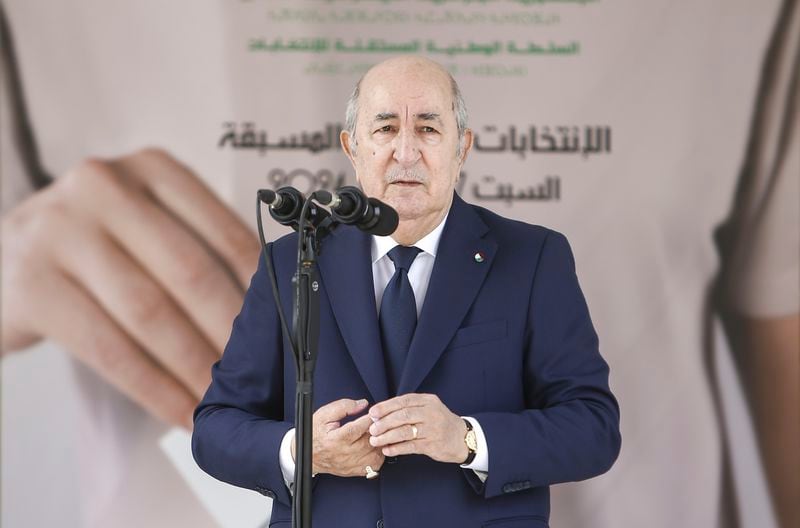 Algerian president and candidate for re-election Abdelmajid Tebboune speaks after casting his ballot inside a polling station during the presidential elections, Saturday, Sept. 7, 2024, in Algiers, Algeria. (AP Photo)