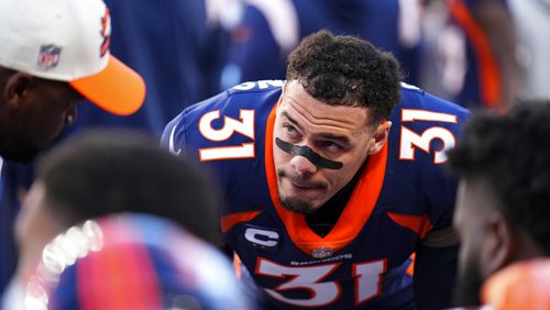 Denver Broncos safety Justin Simmons (31) looks on against the Kansas City Chiefs during the first half of an NFL football game, Sunday, Dec. 11, 2022, in Denver. (AP Photo/Jack Dempsey)